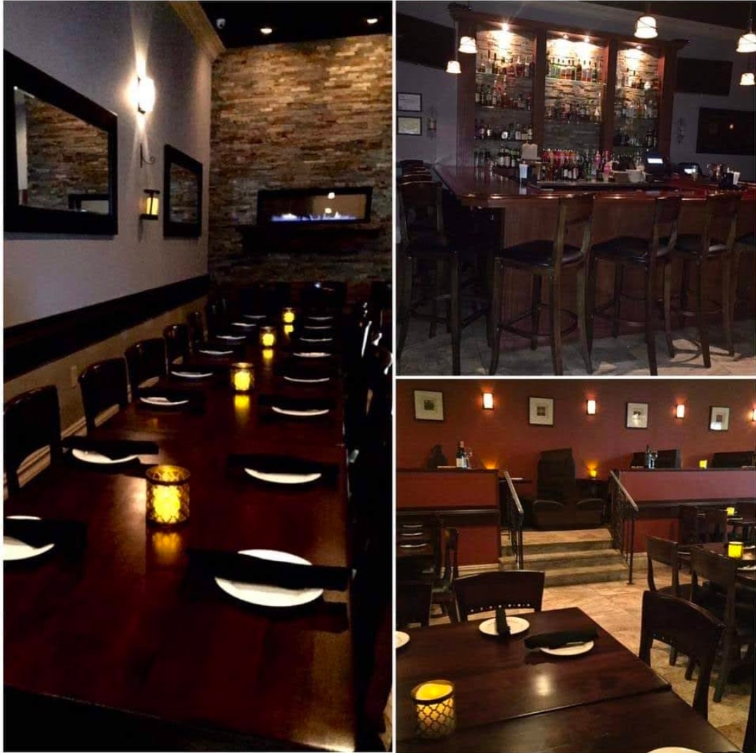 Warm candlelit dining room at Salute